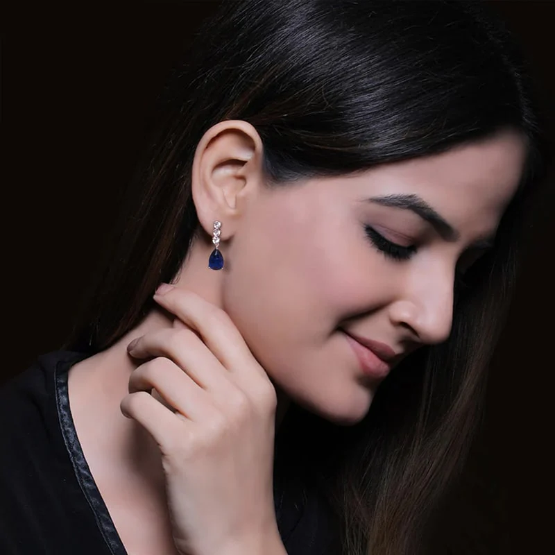vivid stone earrings for night look.